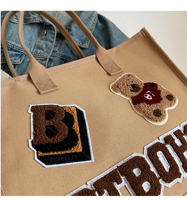 Women's Large Canvas Letter Bear Elegant Classic Style Streetwear Sewing Thread Square Zipper Tote Bag